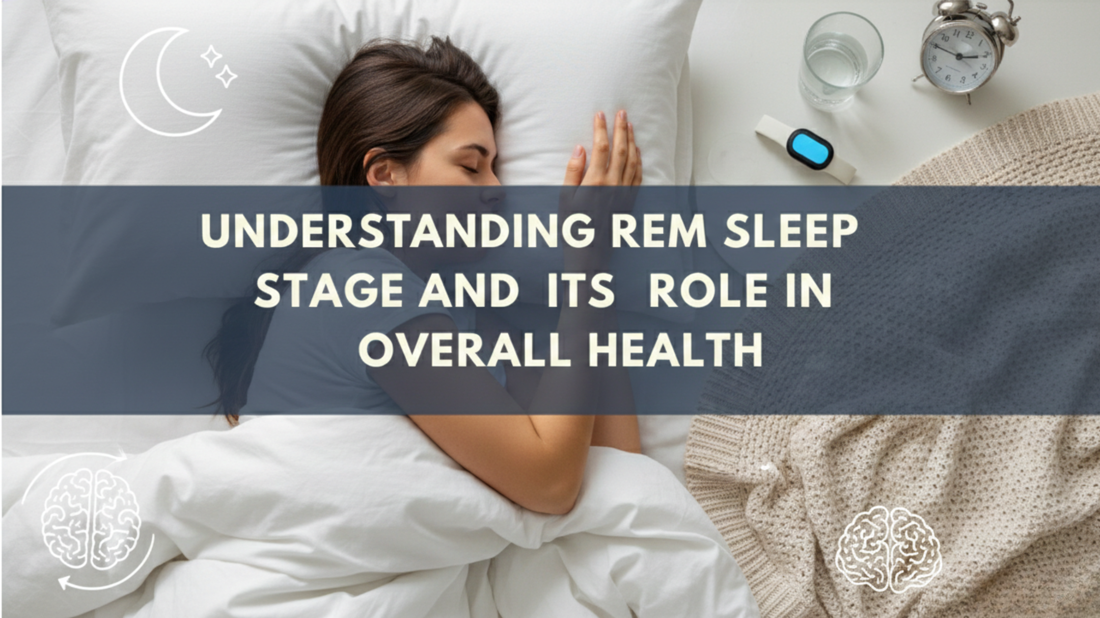 An overhead view of a woman sleeping peacefully in a bed with white linens and a beige knit blanket. A translucent slate-blue banner across the center contains the title "UNDERSTANDING REM SLEEP STAGE AND ITS ROLE IN OVERALL HEALTH" in bold, white uppercase text. The image features subtle white icons of a moon and a brain, along with an alarm clock and a sleep-tracking wearable on the bedside table.